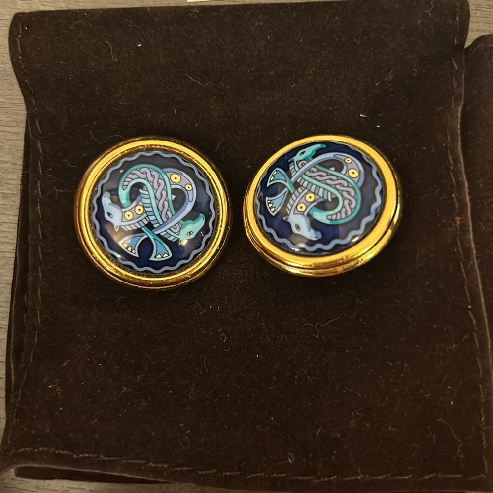 Authentic Hermes Earrings in the original box and pouch, with COA.

1